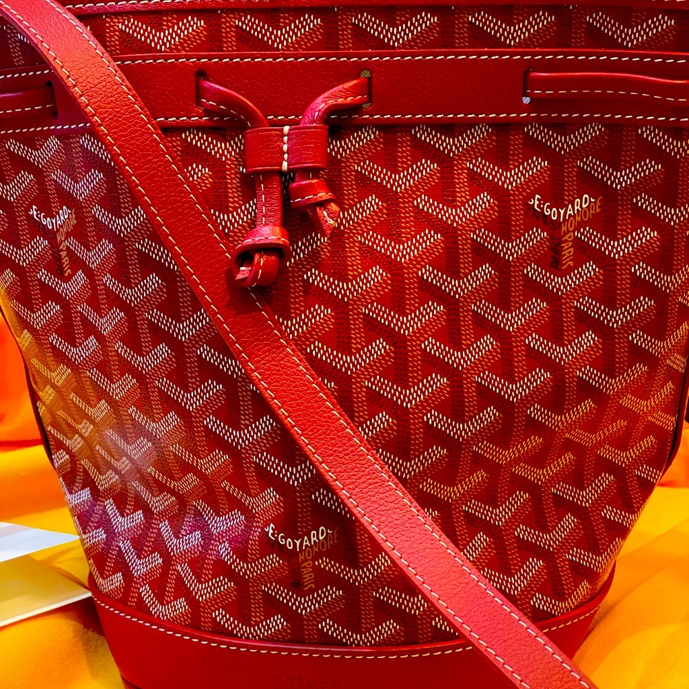 Authentic and Brand new Goyard Petit Bucket Bag in red color. Dust bag & papers
